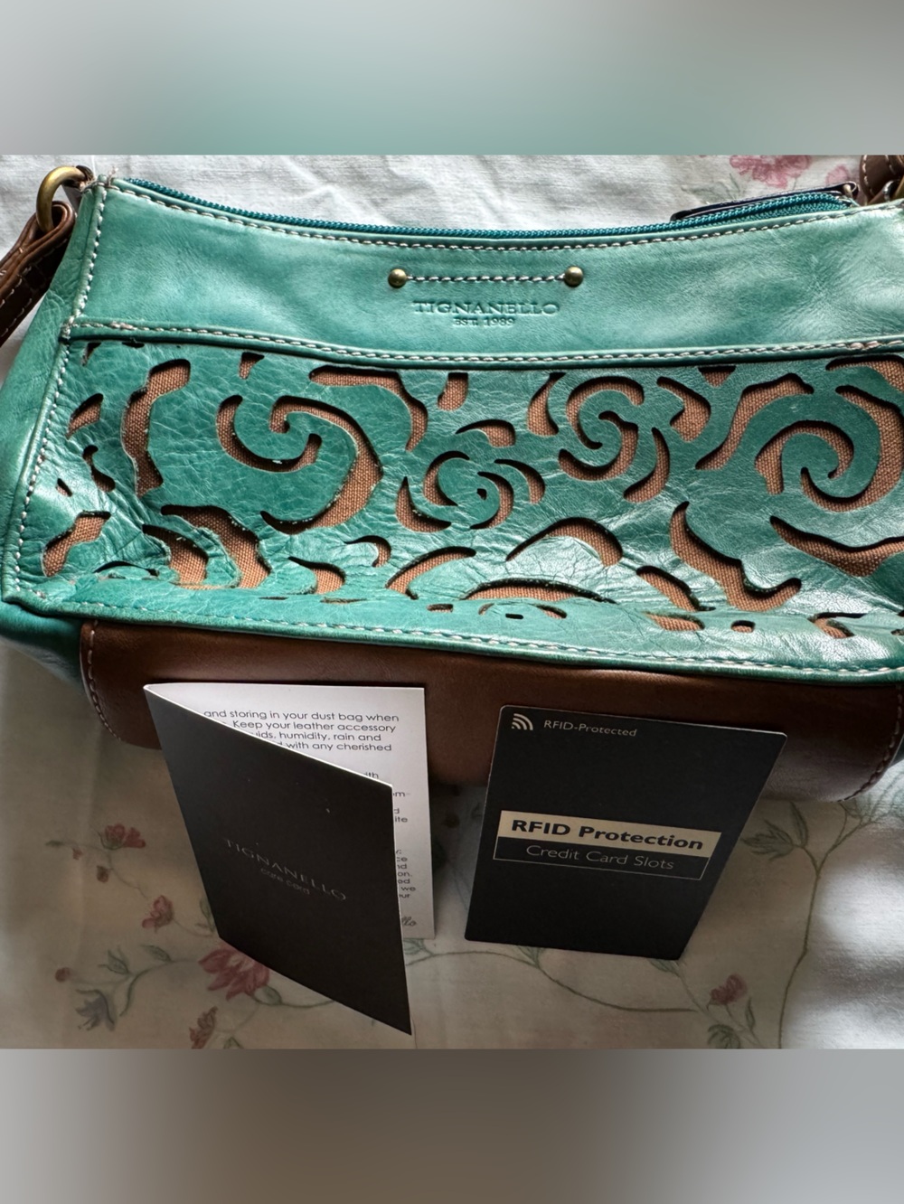 Tignanello Teal and Brown Laser-Cut Crossbody